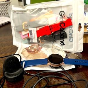 Samsung galaxy watch w/screen protectors and assorted bands/spare charger
